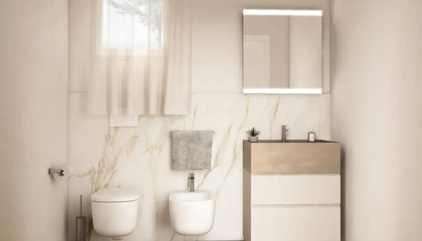 Bagno moderno con WC, bidet e mobile lavabo. Ideale per chi cerca ispirazione su come posare piastrelle bagno con finiture marmorizzate.