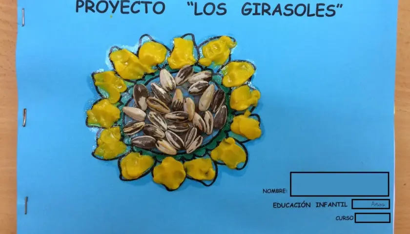Proyecto "Los Girasoles": un girasol hecho con semillas y pintura amarilla, como si fuera obra de un pintor de los girasoles.