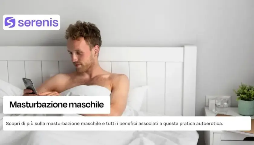 Uomo a letto con smartphone, esplora la masturbazione maschile e i suoi benefici.