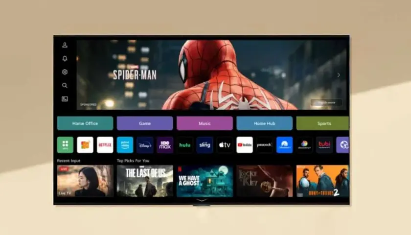Interfejs webOS TV z filmem Spider-Man na ekranie. Widoczne ikony aplikacji: Netflix, HBO Max, Hulu, Prime Video, Disney+, Apple TV, Peacock, Tubi.