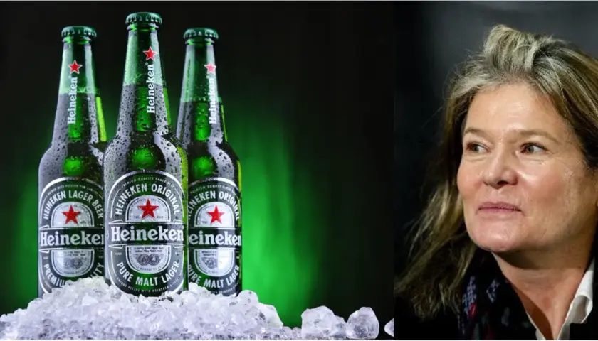 Trois bouteilles de bière Heineken sur de la glace. La famille Heineken possède cette marque emblématique.