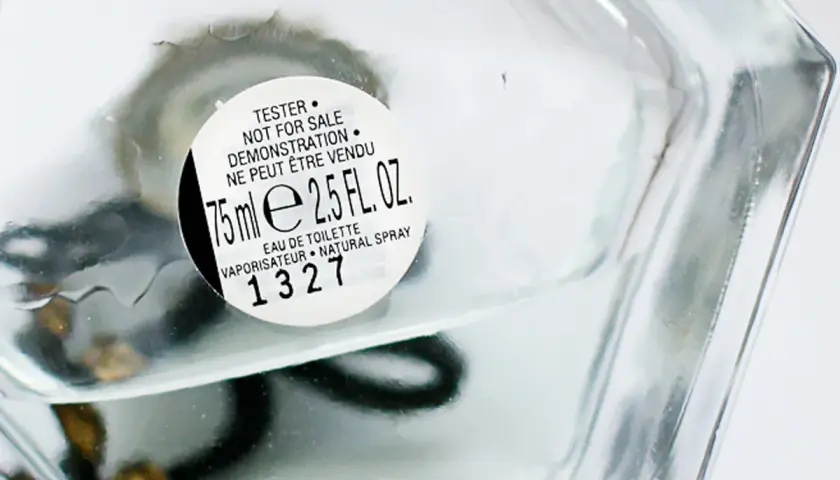 Szklana butelka perfum z etykietą "TESTER NOT FOR SALE". To woda toaletowa, 75 ml.