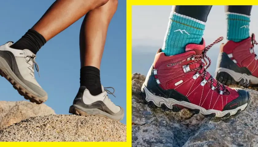 Two pairs of feet in hiking boots navigate rocky terrain. Are hiking boots necessary for this adventure?