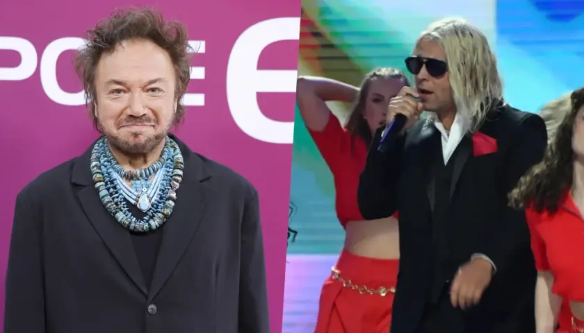 Mietek Szcześniak, znany partner sceniczny, w czarnym garniturze i z efektowną biżuterią. Obok niego wokalista z blond włosami i tancerki.