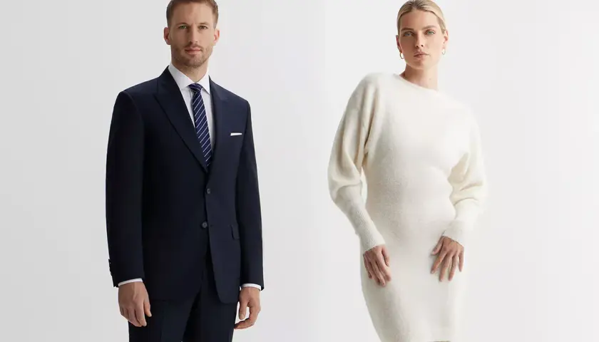 Elegancki mężczyzna w granatowym garniturze i kobieta w kremowej sukience. Idealne stylizacje, jak się ubrać na wigilię firmową.