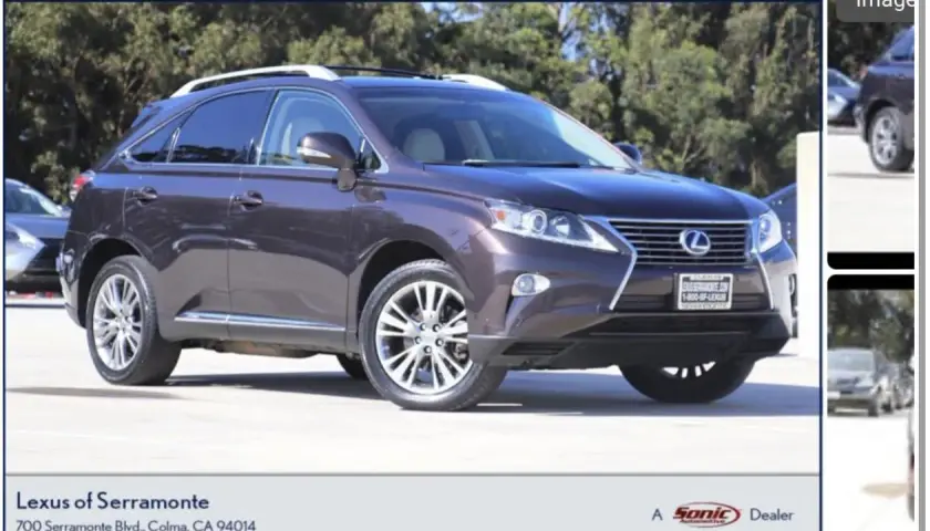 Mörkbrun Lexus RX 450h, en SUV med takräcken. Kanske ett lexus rx 450h problem som behöver åtgärdas?