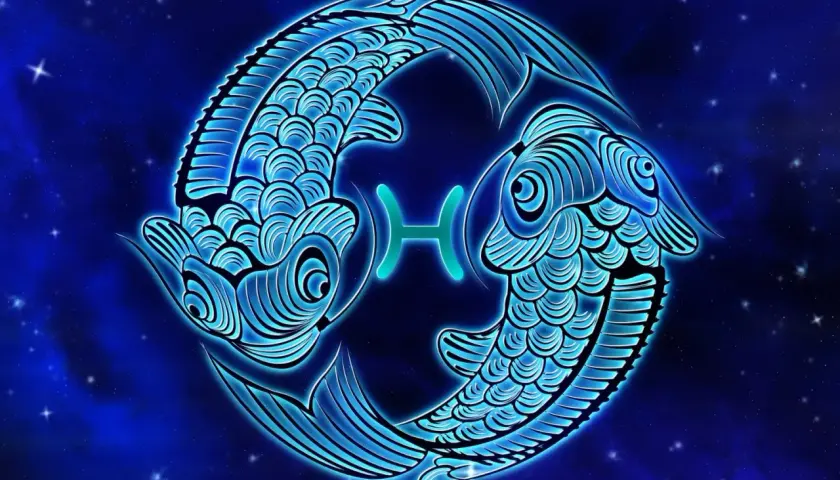 Dwa niebieskie, stylizowane ryby tworzą symbol Ryb, znaku zodiaku dla osób urodzonych 21 lutego.