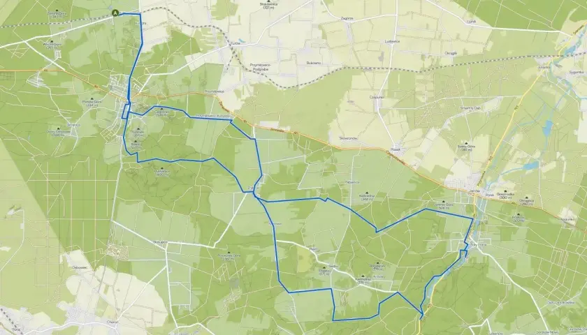 Mapa z zaznaczonymi trasami rowerowymi wokół Olsztyna. Trasa prowadzi przez lasy i tereny pagórkowate.