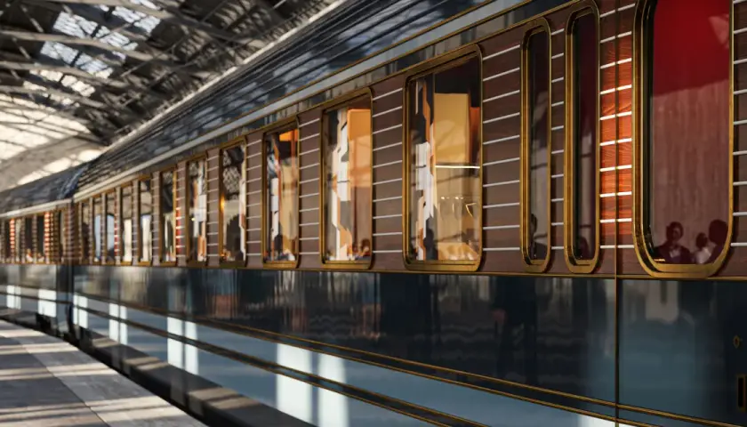 Lussuoso treno con finiture in legno e oro, pronto per il suo percorso Orient Express. Riflessi di passeggeri eleganti nelle finestre.