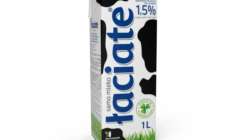 Karton mleka 1,5% tłuszczu, z napisem "laciate" i wzorem w krowie łaty. Idealne mleko po francusku na śniadanie.