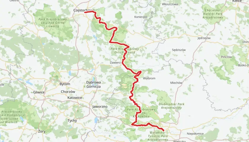 Mapa z zaznaczonym czerwonym szlakiem rowerowym, biegnącym przez Park Krajobrazowy Orlich Gniazd, od Częstochowy po okolice Krakowa.