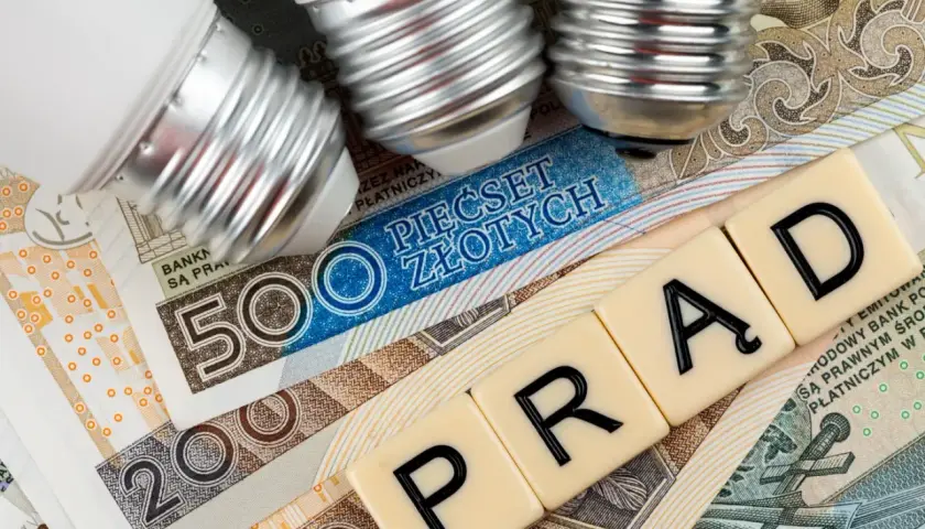 Żarówki na banknotach 500 i 200 zł, litery układające się w słowo "PRĄD".