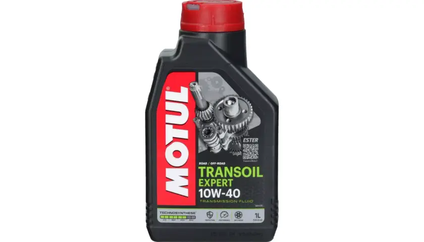 Czarna butelka oleju Motul Transoil Expert 10W-40 z czerwonym korkiem i grafiką przekładni.