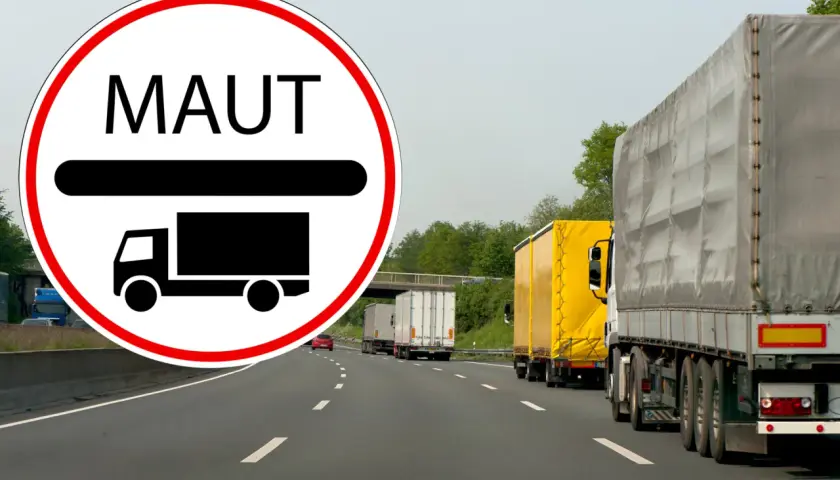Znak MAUT informuje o opłatach drogowych w Niemczech dla pojazdów do 7,5 tony. Na autostradzie widać sznur ciężarówek.