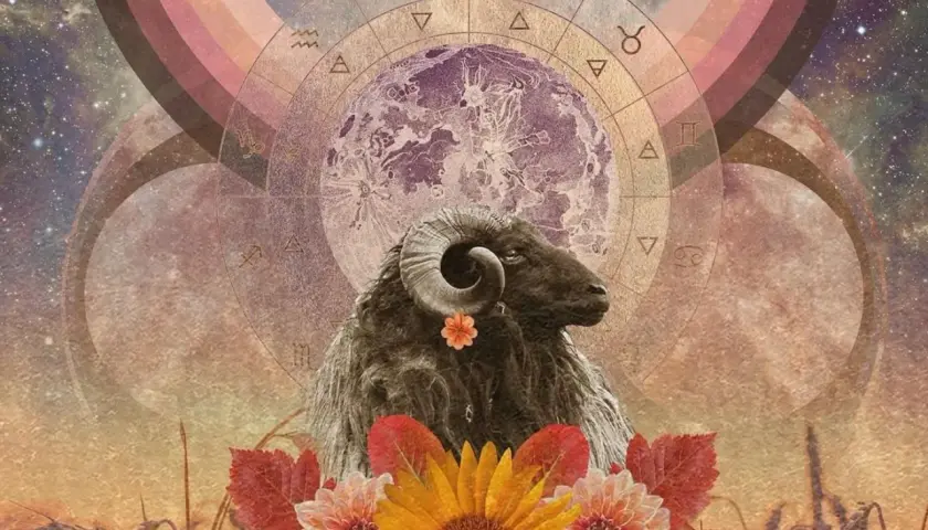 Baran z ozdobnym kwiatkiem, pod tęczowym łukiem i tarczą zodiaku. Mars w Baranie symbolizuje siłę i determinację.