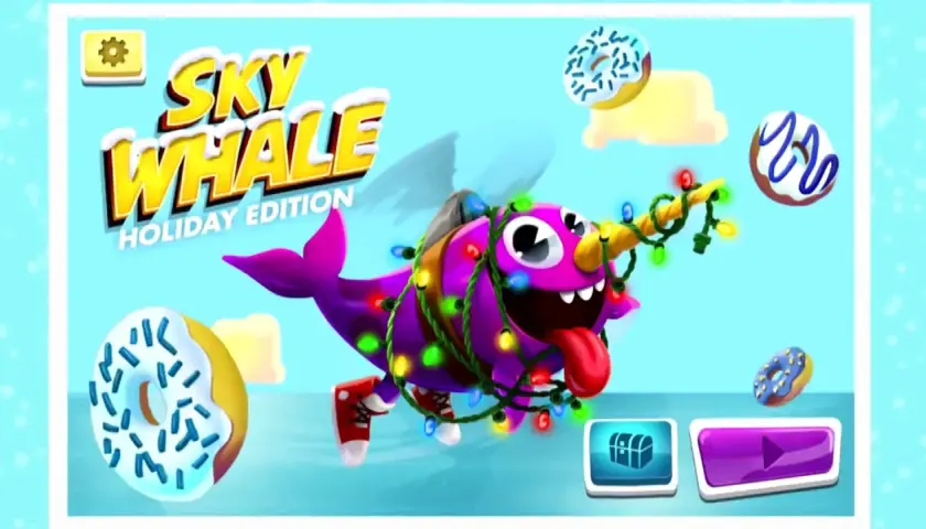 Gra "Sky Whale: Holiday Edition" z serii Game Shakers. Jak wydać grę? Wesoły fioletowy wieloryb w świątecznych lampkach i pączkach.