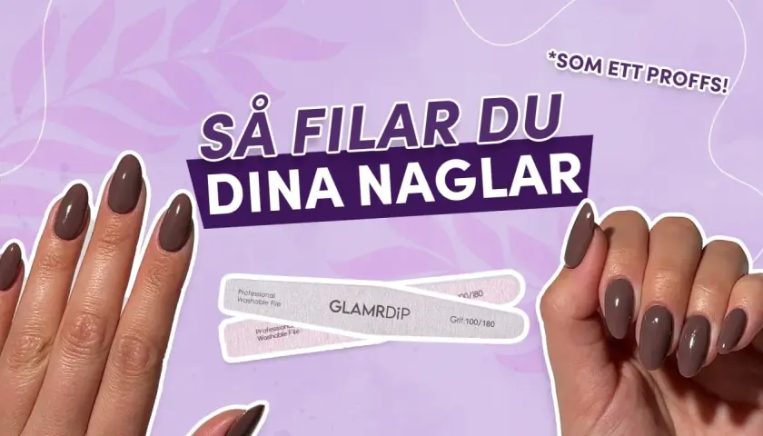Vackra, ovala naglar med ett elegant grått nagellack. Två GlamDip nagelfilar ligger bredvid, redo att forma dina naglar som ett proffs.