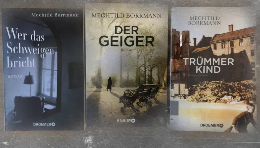 Drei Romane von Mechthild Borrmann: "Wer das Schweigen bricht", "Der Geiger" und "Trümmerkinder".