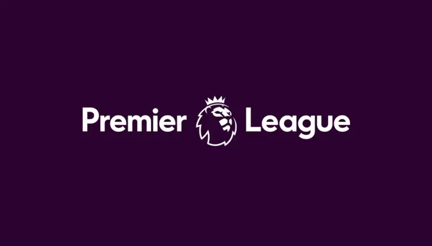 Logo Premier League z białym lwem w koronie i napisem "Premier League" na fioletowym tle.