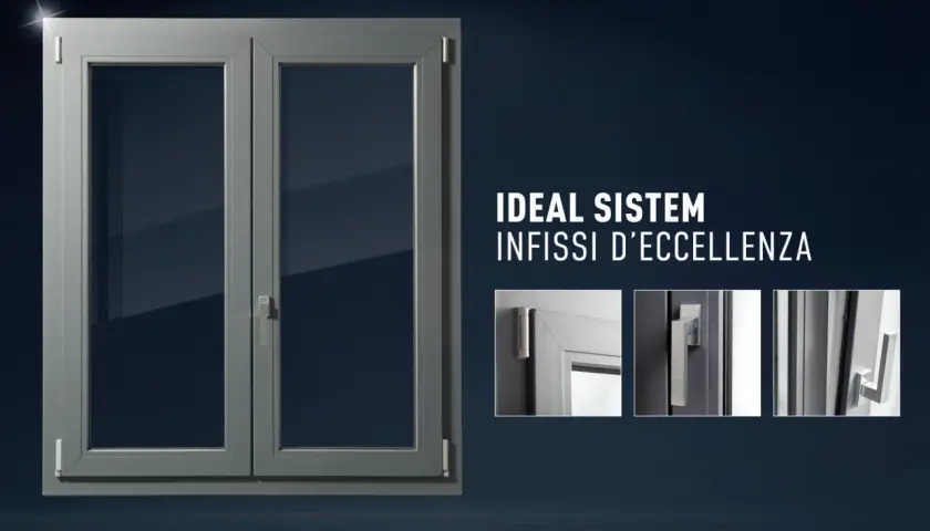 Finestra grigia a doppio battente, con dettagli maniglie e cerniere. Scopri il bonus finestre come funziona con Ideal Sistem.