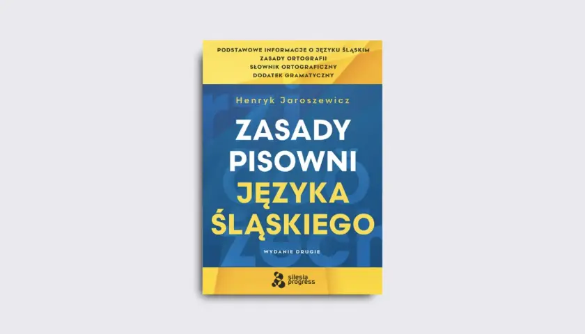 Okładka książki "Zasady pisowni języka śląskiego" Henryka Jaroszewicza. W tle subtelny ukośnik.
