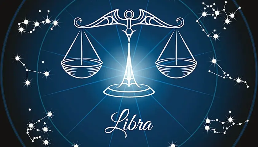 Symbol wagi znak zodiaku, otoczony konstelacjami na tle nocnego nieba.