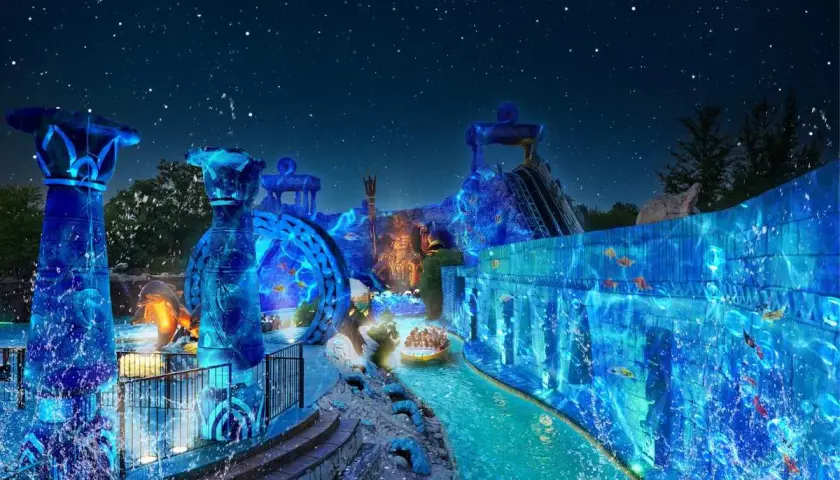 Un'emozionante nuova gardaland attrazione 2026: un viaggio acquatico tra colonne illuminate, cascate e creature marine, sotto un cielo stellato.