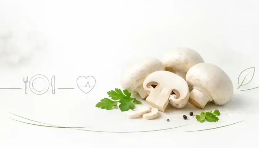 Świeże pieczarki z natką pietruszki i ikoną serca. Czy pieczarki są zdrowe? Tak, to pyszny i wartościowy dodatek do diety.