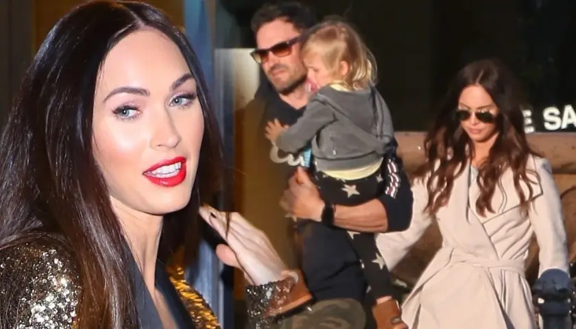 Megan Fox z dziećmi, w tym małym chłopcem niesionym przez mężczyznę.