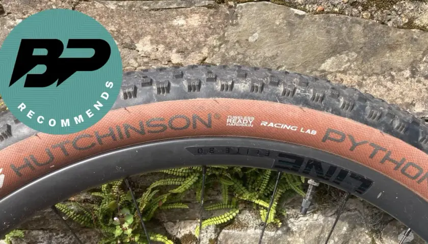 Close-up of a Hutchinson Python tire on a bike wheel, with a "BP Recommends" logo.