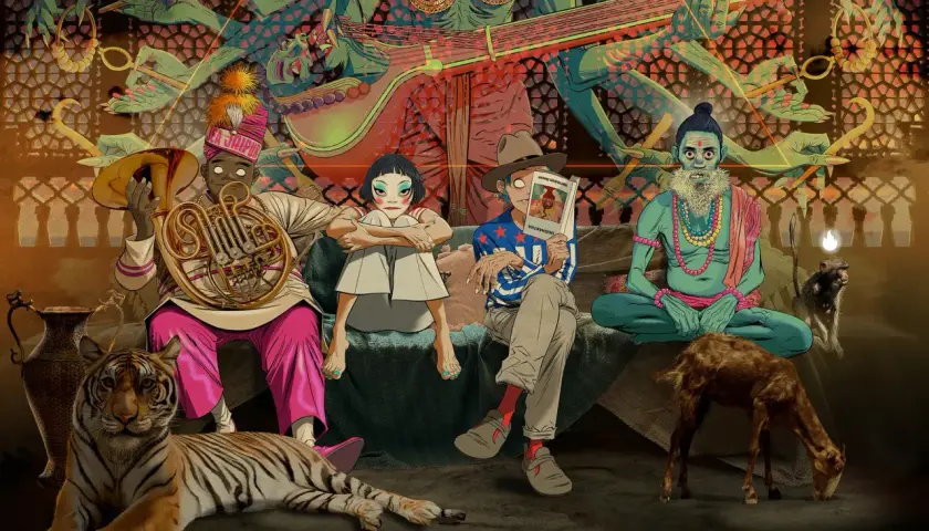 Gorillaz koncerty w Indiach? Postacie siedzą obok tygrysa, kozy i małpy, w tle hinduskie bóstwo.