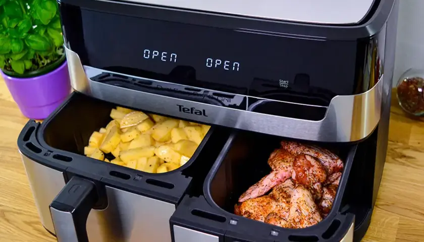 Dwukomorowy Tefal z frytkami i kurczakiem, idealny do rankingu air fryer.