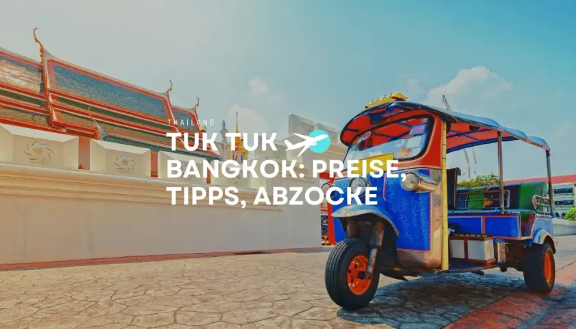 Buntes Thailand Tuk Tuk vor einem Tempel in Bangkok. Tipps für Preise und Abzocke.