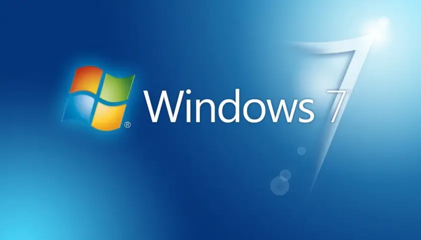 Logo Windows 7 na niebieskim tle. Klasyczny wygląd systemu, który wielu wspomina z sentymentem.