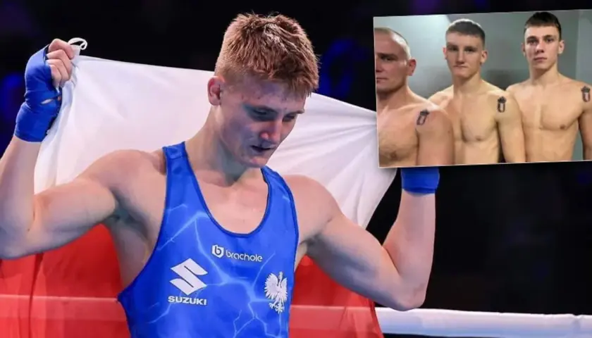 Młody polski bokser w niebieskim stroju z orłem na piersi, trzymający biało-czerwoną flagę. W rogu widać zdjęcie trzech młodych mężczyzn.