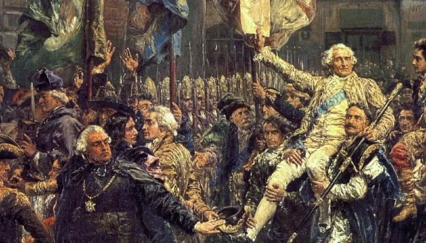 Tłum niesie na rękach mężczyznę w złocistym stroju, trzymającego dokument. Czy to symboliczny moment, który można nazwać "co to oświecenie"?