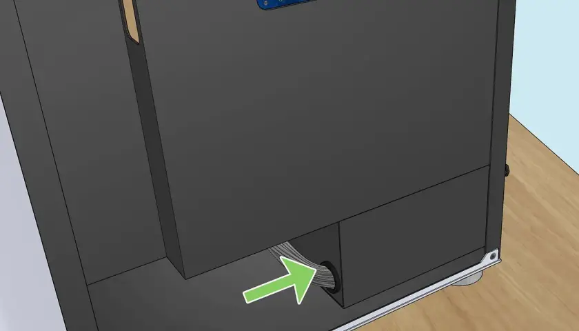 Flèche verte indiquant le passage des câbles pour le test alimentation pc.