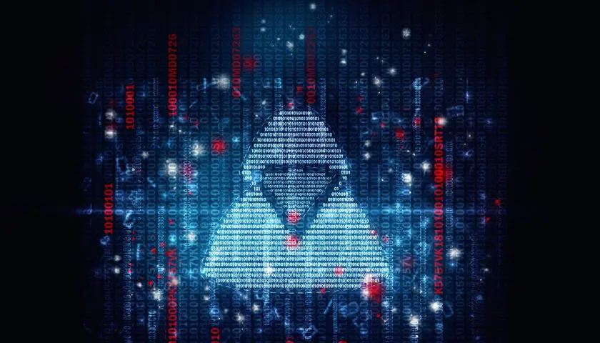Trójkąt z kodu binarnego na tle danych, symbolizujący zagrożenie ransomware.