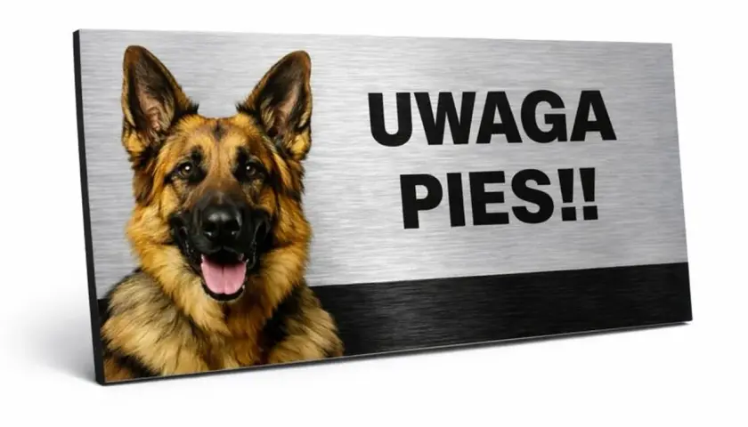 Tabliczka z napisem "UWAGA PIES!!" i wizerunkiem owczarka niemieckiego. Czy taka tabliczka uwaga pies jest obowiązkowa?