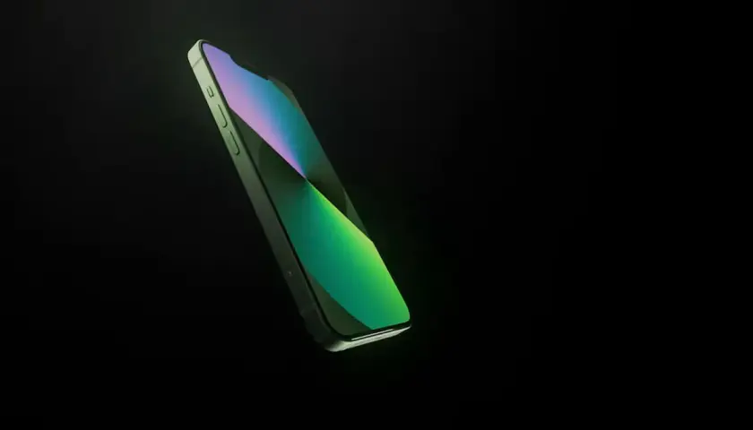 Zielony iPhone 13 w locie, idealny do uchwycenia każdej chwili. Poznaj jego wymiary.