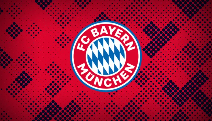 Herb FC Bayern Monachium na tle czerwono-granatowych kropek. Duma Bawarii.