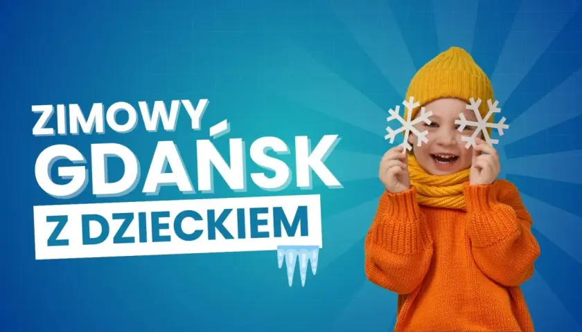 Zimowy Gdańsk z dzieckiem: uśmiechnięty maluch w żółtej czapce i szaliku trzyma płatki śniegu przed oczami. Odkryj atrakcje dla dzieci!