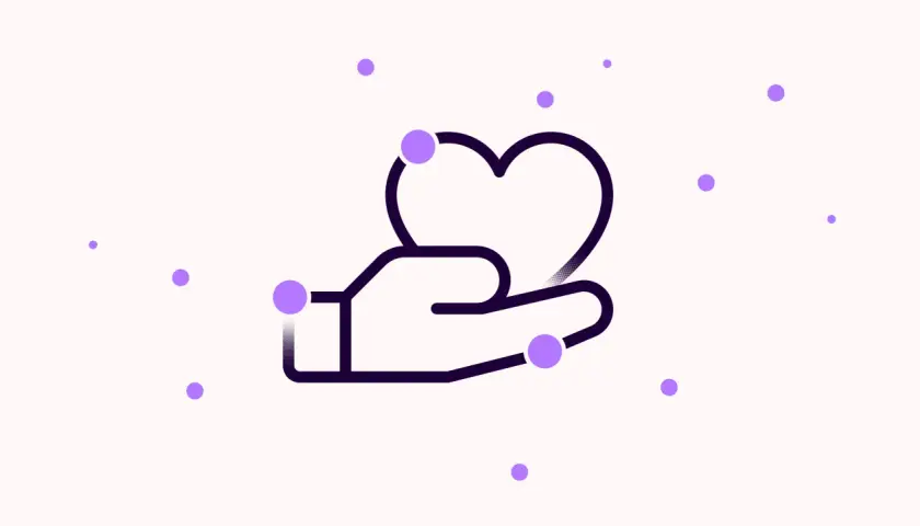 A hand holds a heart, surrounded by floating purple dots. This imagery can affect labeling by visually representing care and connection.