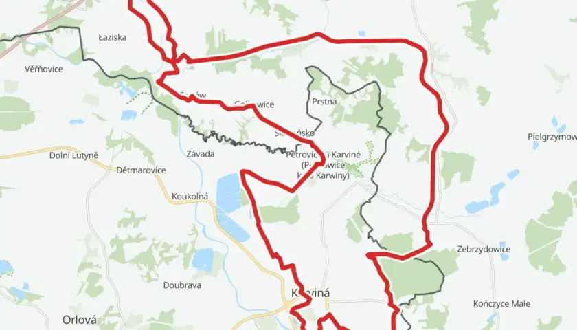 Mapa z zaznaczonym na czerwono żelaznym szlakiem rowerowym, biegnącym przez tereny Czech i Polski, w okolicach Karwiny i Jastrzębia-Zdroju.