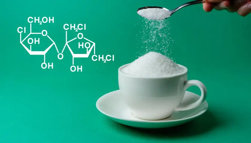 Wzór chemiczny sukralozy obok filiżanki cukru. Dowiedz się, sukraloza co to jest i jak działa.