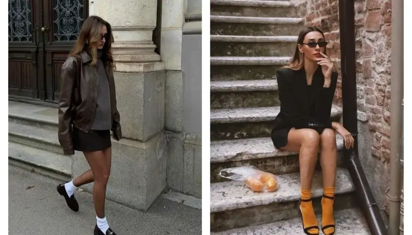Deux femmes stylées : l'une en veste en cuir marron et chaussettes blanches, l'autre en blazer noir avec des chaussettes orange vif.