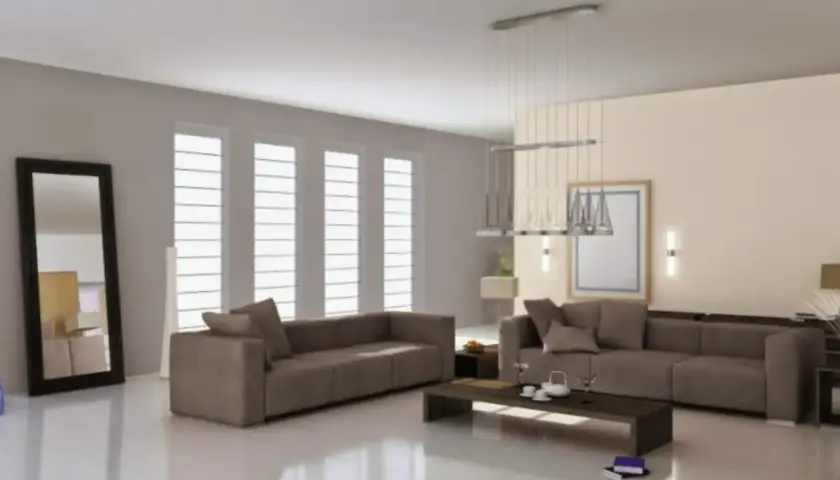 Soggiorno moderno con divani color tortora e grigio, tavolino scuro, specchio alto e grandi finestre.