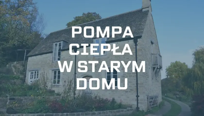 Pompa ciepła w starym domu z kamienia, otoczonym zielenią. Nowoczesne ogrzewanie w zabytkowej architekturze.