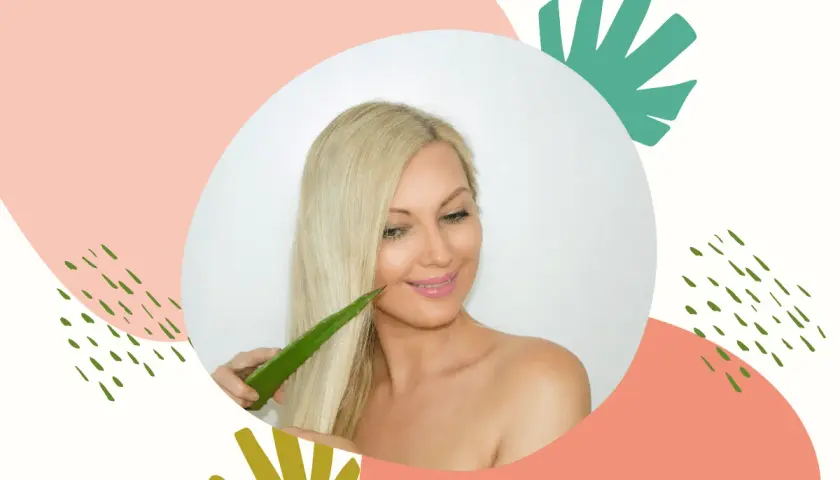 Kobieta z blond włosami dotyka ich liściem aloesu, odkrywając jego pielęgnacyjne właściwości. Aloes na włosy to sekret piękna.