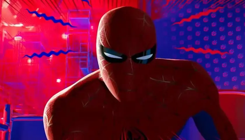 Spider-Man, prêt à utiliser son pouvoir, se tient dans une ville aux couleurs vives, rouge et bleue.